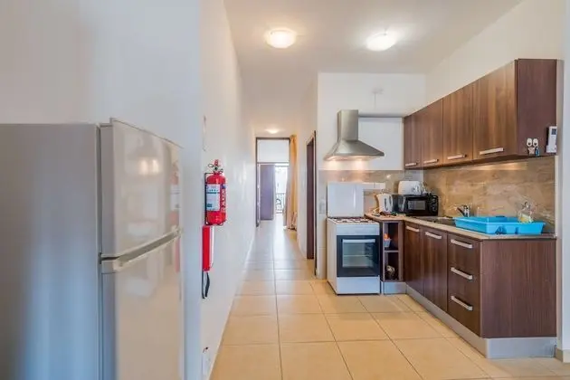 Seashells Self Catering Apartment by Getaways Malta - Mutfak