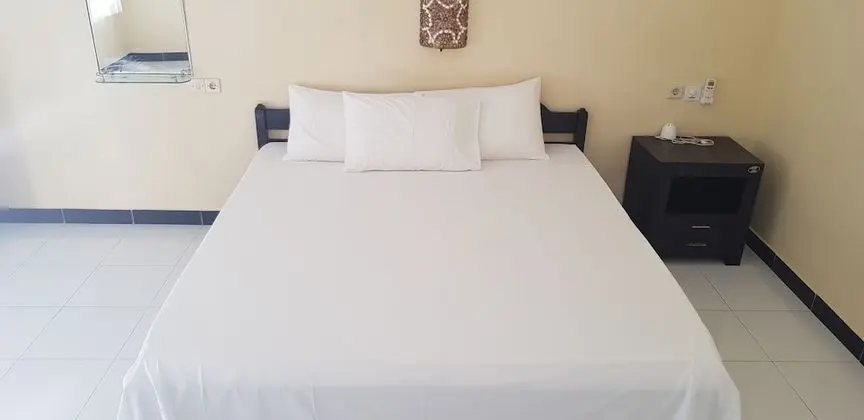 Segara Beach Inn - Oda
