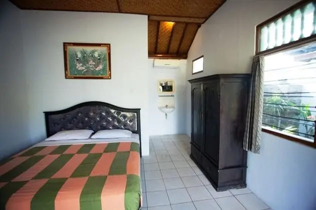 Segara Bukit Seaside Cottages - Oda