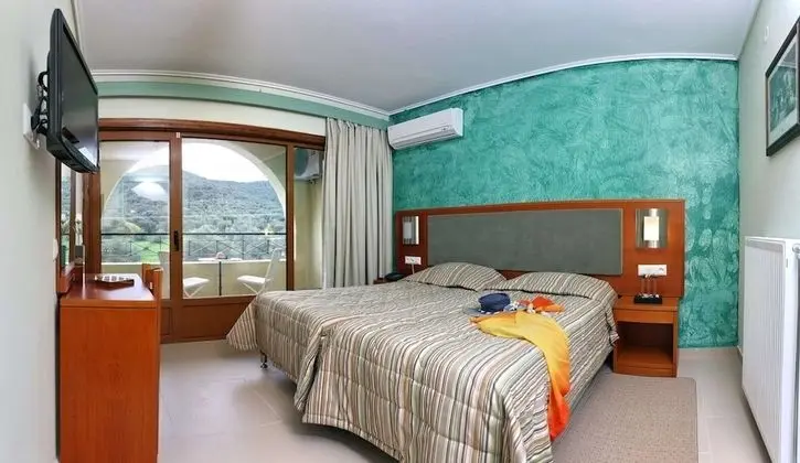 Silver Bay Hotel & Bungalows - Oda