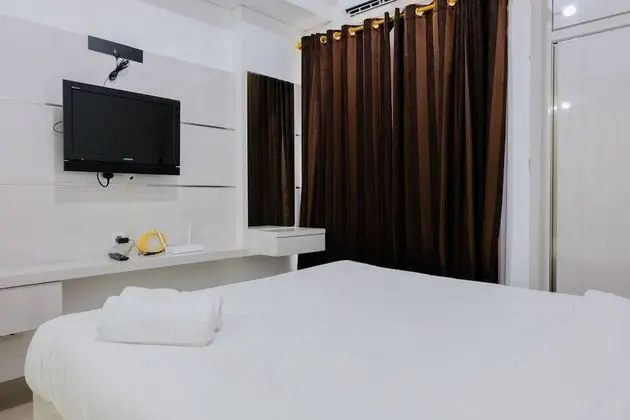 Simple Studio Room at Poris 88 Apartment