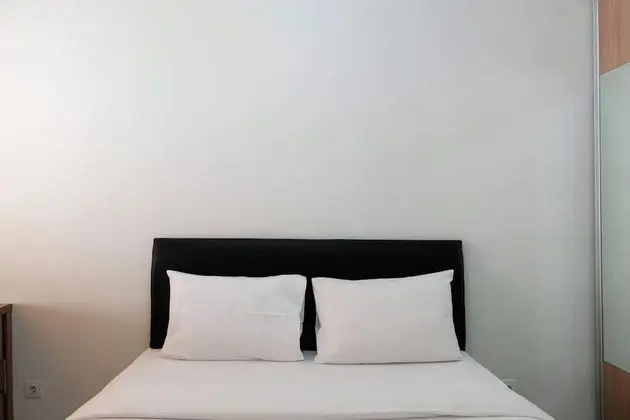 Simply Furnished Studio Apartment at Scientia Residence