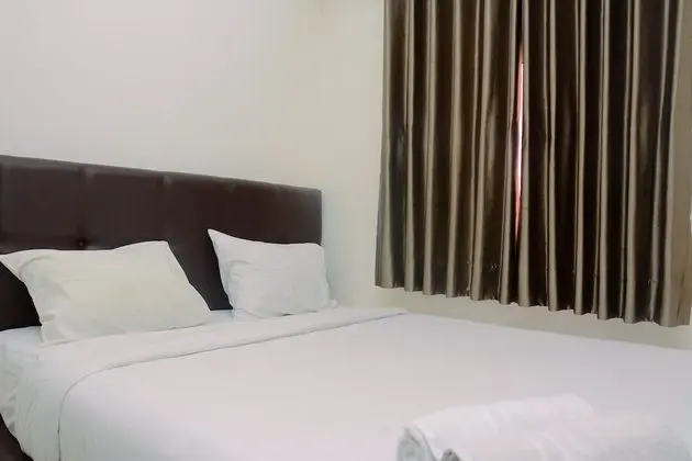 Simply Modern 2BR Green Pramuka Apartment