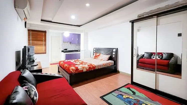 Smile Room at Cibubur Village Apartment - Oda
