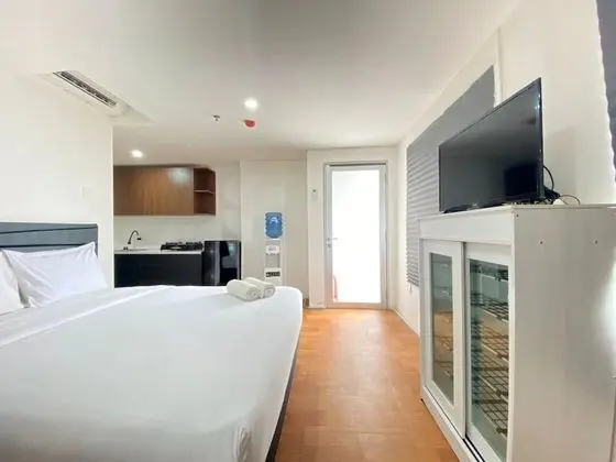 Spacious Studio Room at Apartment Grand Asia Afrika Residence - İç Mekan