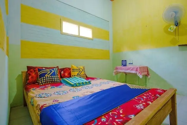 SPOT ON 1762 Gandrung Payungan Family Inn - Oda