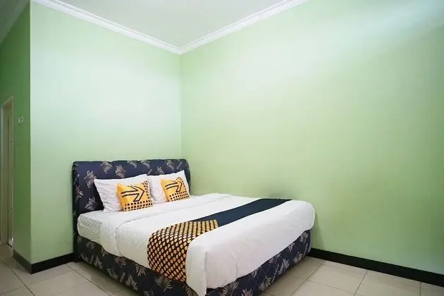 SPOT ON 2729 Marzan Syariah Guest House - Öne Çıkan Resim