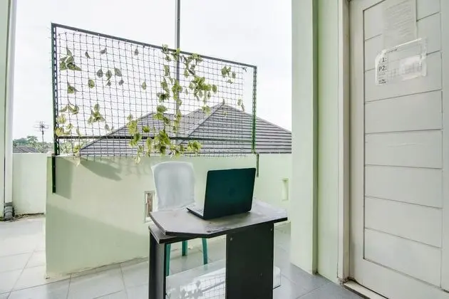 SPOT ON 91858 Raja Homestay Syariah - Lobi