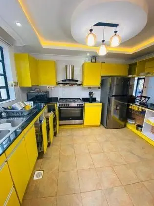 Stay.Plus Kitale Holiday Home - Mutfak