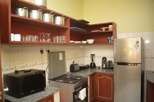 Stay.Plus Sunset Paradise Apartment - Mutfak