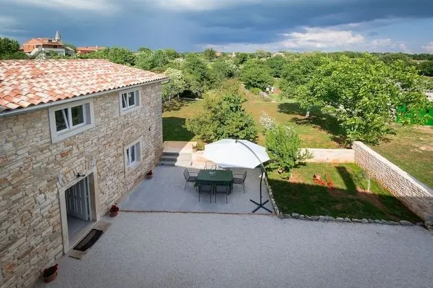Stone house Furlani with a lovely garden