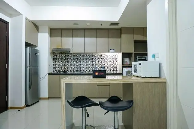Strategic and Exclusive Stay 1BR @ Casa Grande Apartment - Mutfak