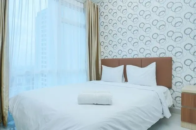 Strategic Location 1BR Apartment @ Puri Mansion near Puri By Travelio - Öne Çıkan Resim