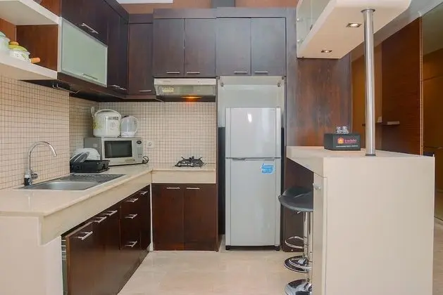 Strategic Location 2BR Apartment at FX Residence By Travelio - Mutfak