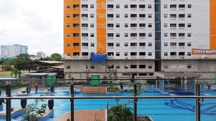 Studio Room at Green Pramuka City Apartment with Mall Access By Travelio