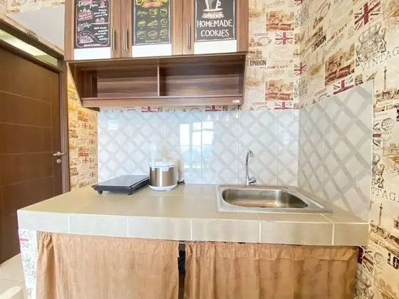Stunning And Comfy 2Br At Mekarwangi Square Cibaduyut Apartment - Mutfak