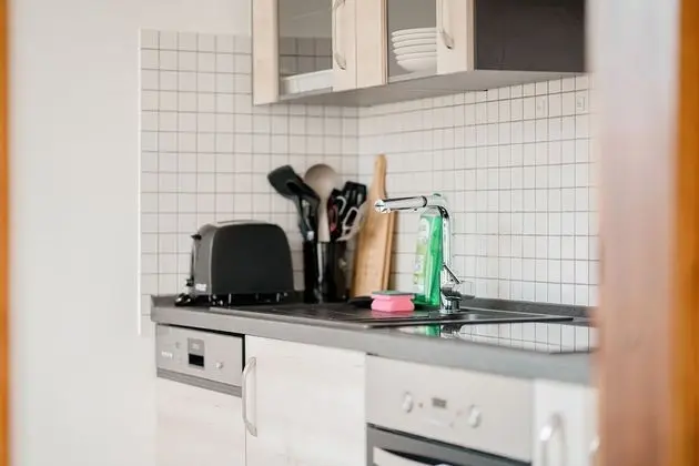 Stylish Minimalism in Kirchberg - Mutfak