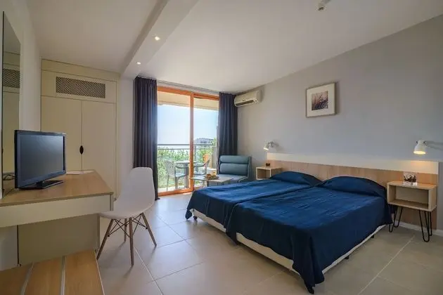 Sunrise Hotel - Oda