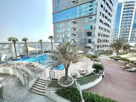 SuperHost - Apartment With Stunning Pool View in Business Bay