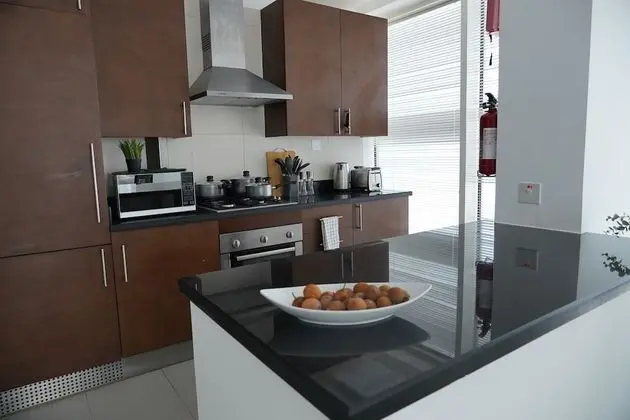 SuperHost- Next to Dubai Canal | Elegant 1 BR | Business Bay - Mutfak
