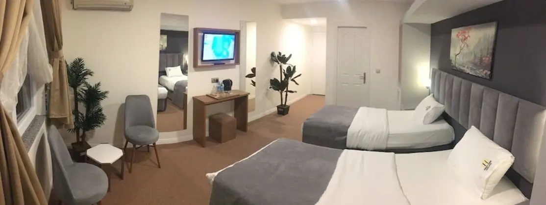 Sweet Home Suite Hotel - Oda
