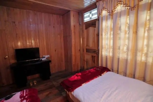 Tengchong Ginkgo Village Bencai Hotel - Oda