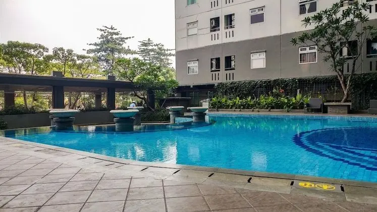 Tidy 2BR with Modern Design Green Pramuka City Apartment