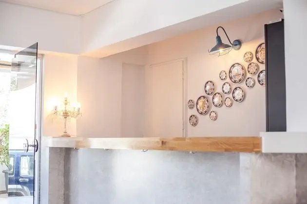Tinas Plus Hotel - Lobi