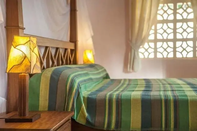 Tiwani Sunset, a Little Piece of Eden