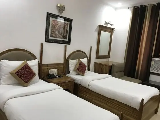 Hotel TJS Royale - Oda