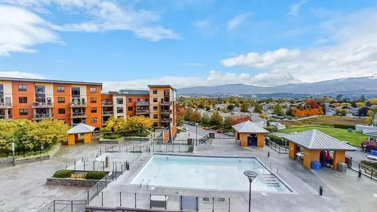 Top Floor Corner Unit With Pool and Lake View
