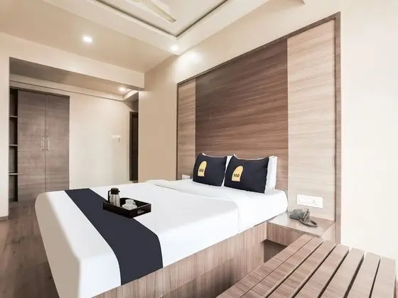 Townhouse OAK Hotel Mahadev Residency - Oda