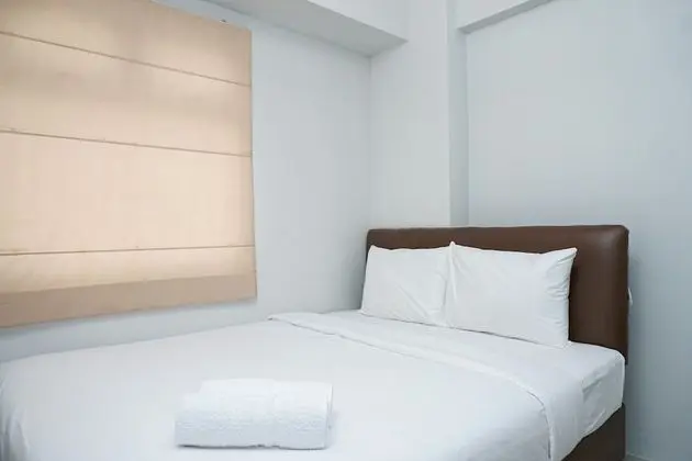 Tranquil Green Pramuka 2BR Apartment near Shopping Center