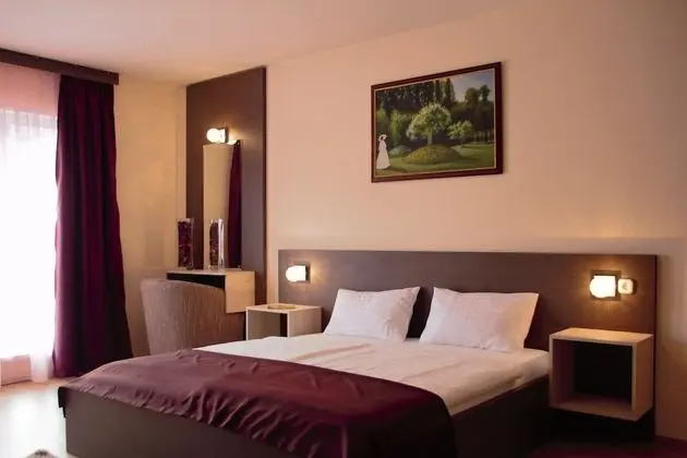 Triple M Hotel - Oda