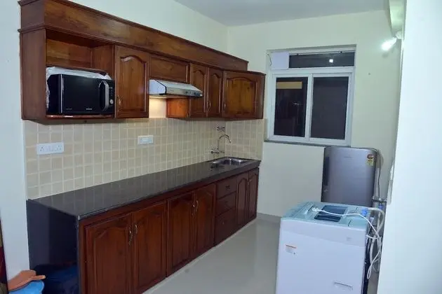 TripThrill Costa Holidays 1BHK Apartment - Mutfak