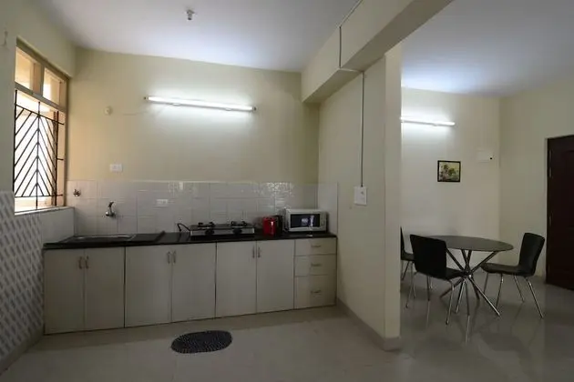 TripThrill West Winds 1BHK Apartment - Mutfak