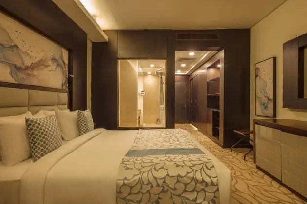 TRIUMPH LUXURY HOTEL - Oda