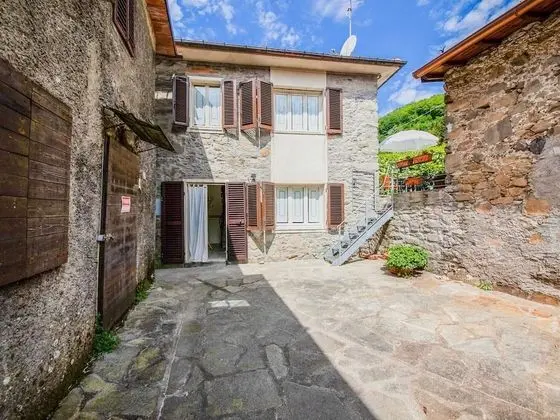 Tuscan House Built on the Hill of a Small Mountain Village