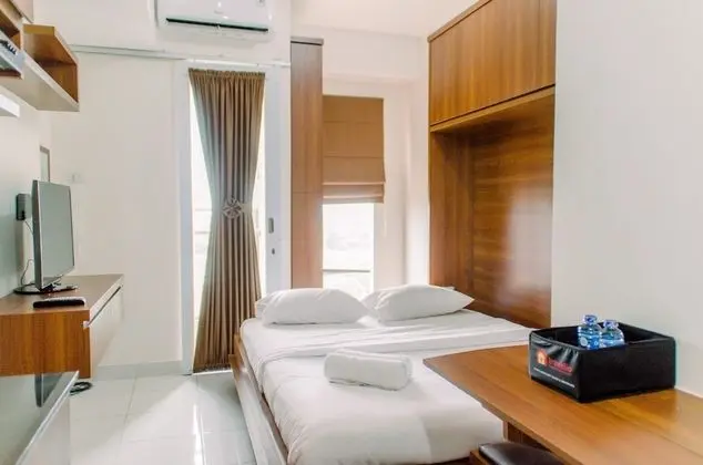 Unique Studio With Folded Bed Amazana Serpong Apartment - Oda