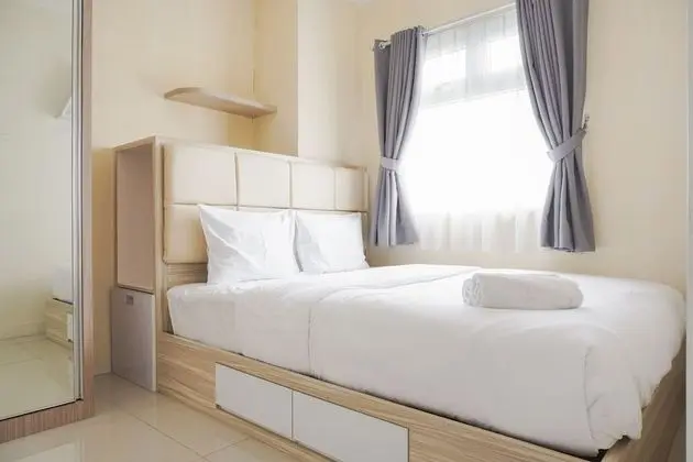 Vibrant 2Br With Sofa Bed Apartment At Green Pramuka City
