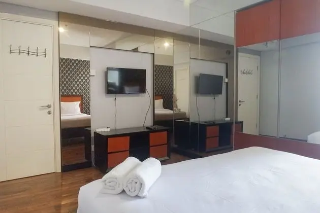 Vibrant And Luxurious 2Br Apartment At Trillium Residence Surabaya - Oda
