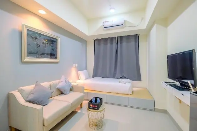 Warm And Cozy Studio Evenciio Apartment Margonda Near Ui