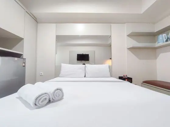 Warm And Cozy Style Studio Room At Paltrow City Apartment