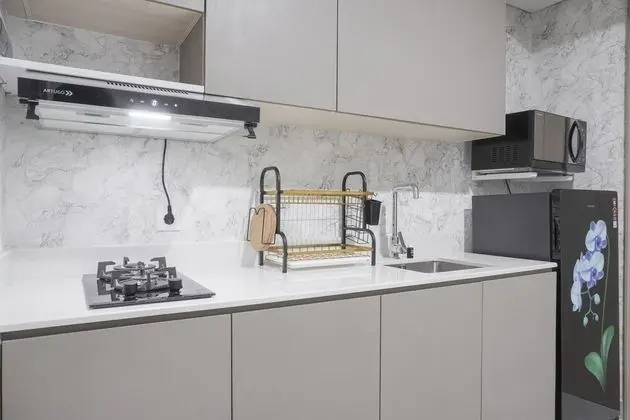 Warm And Elegant 1Br At Gold Coast Apartment - Mutfak