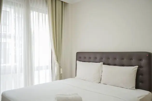 Warm and Simple 1BR at Asatti Apartment