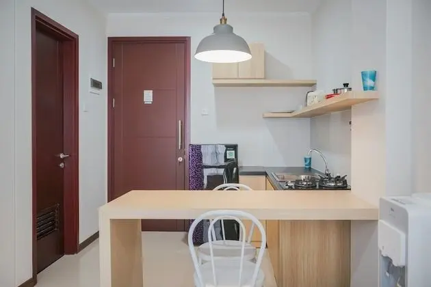 Warm and Simple 1BR at Asatti Apartment - Mutfak