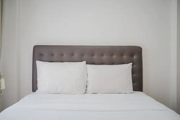 Warm and Simple 1BR at Asatti Apartment - Oda