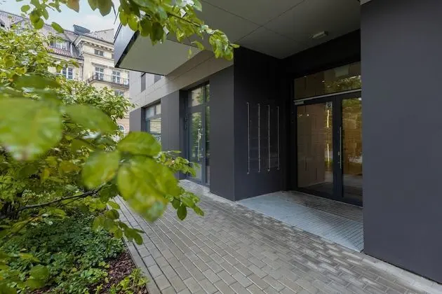Warsaw Aleja Solidarności by Renters