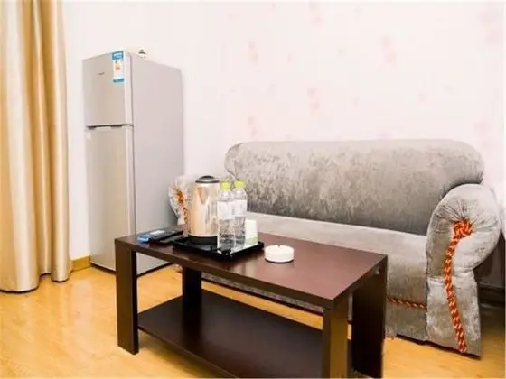 Weihai Dushang Huayi Apartment Hotel - Oda Düzeni