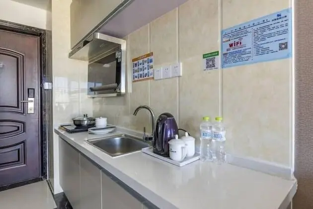 Weihai Yinxiang Holiday Apartment - Mutfak